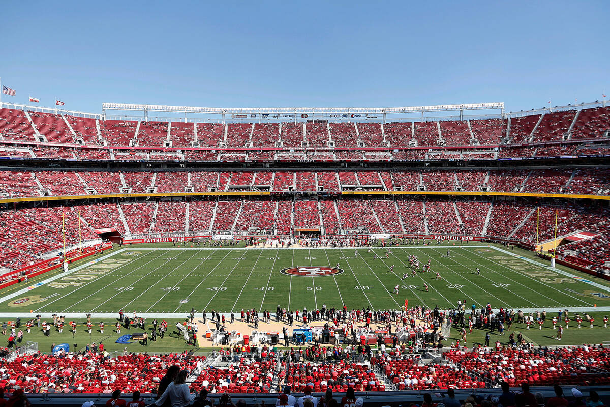 In this Oct. 7, 2018, file photo, fans watch an NFL football game between the San Francisco 49e ...
