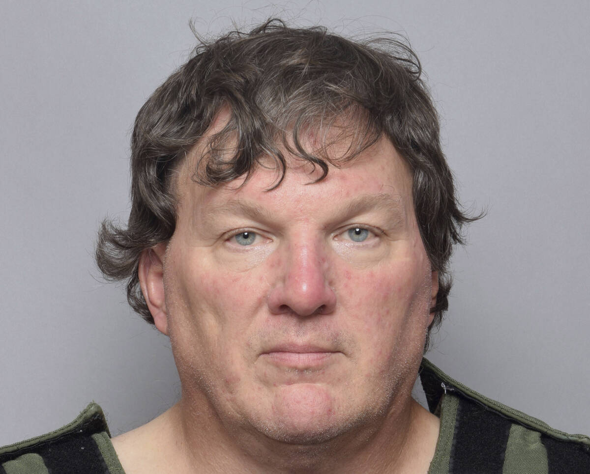 This booking image provided by the Suffolk County Sheriff’s Office shows Rex Heuermann, a Lon ...