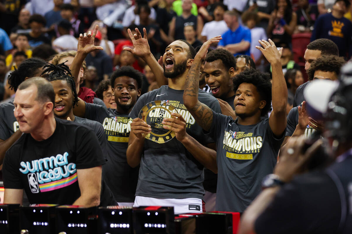 Cleveland Cavaliers forward Isaiah Mobley (15) holds the MVP trophy after winning the NBA Summe ...