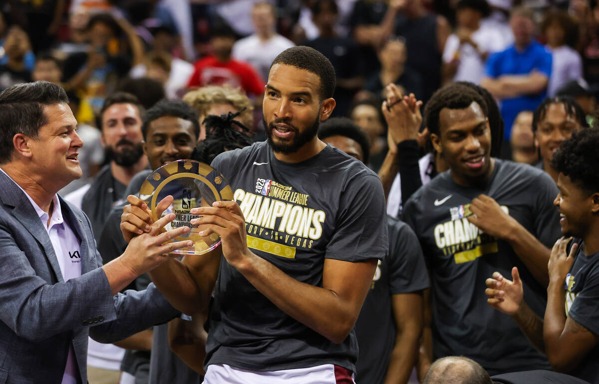 Cleveland Cavaliers forward Isaiah Mobley (15) holds the MVP trophy after winning the NBA Summe ...