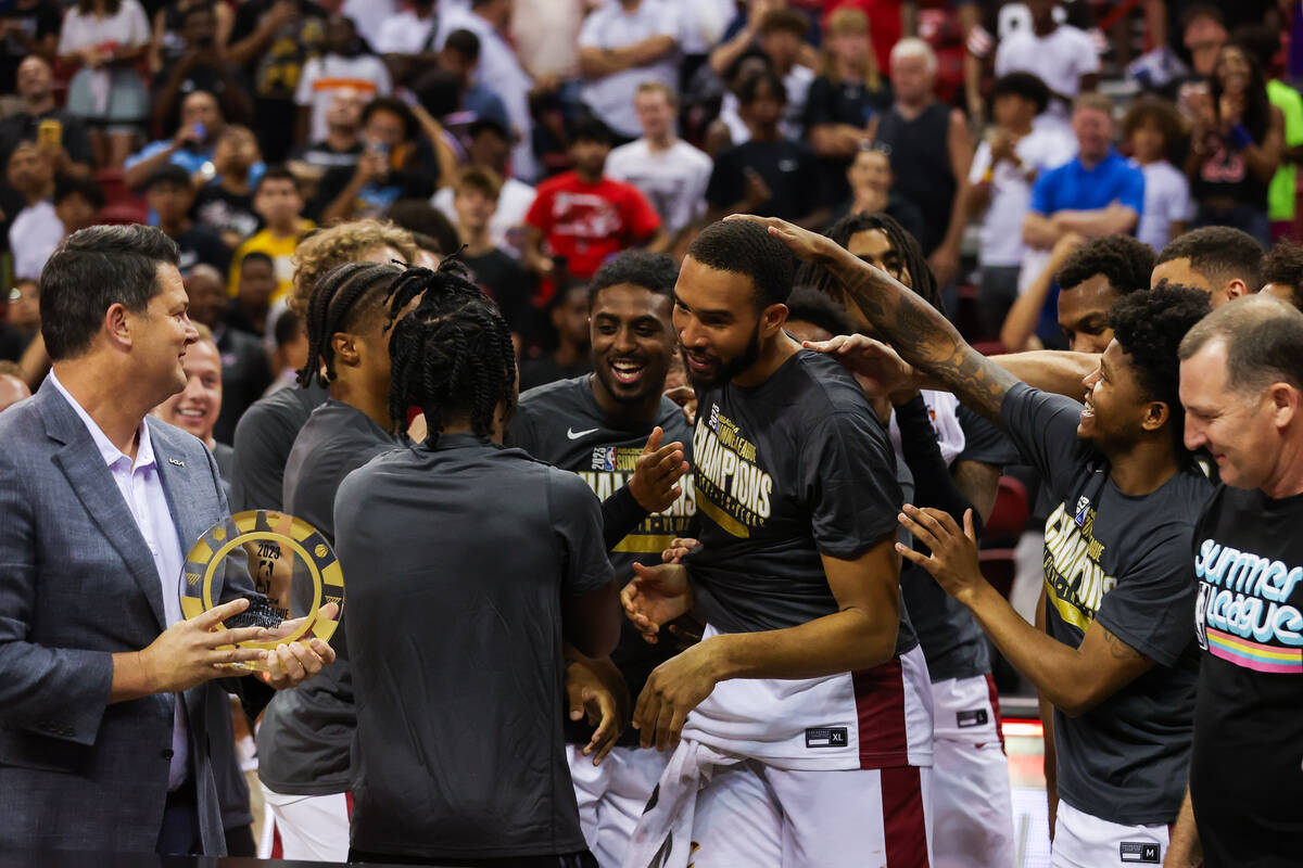 Cleveland Cavaliers forward Isaiah Mobley (15) is congratulated by his teammates after being pr ...