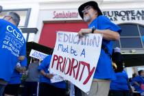 An educator with the Clark County Education Association protests outside Superintendent Jesus J ...