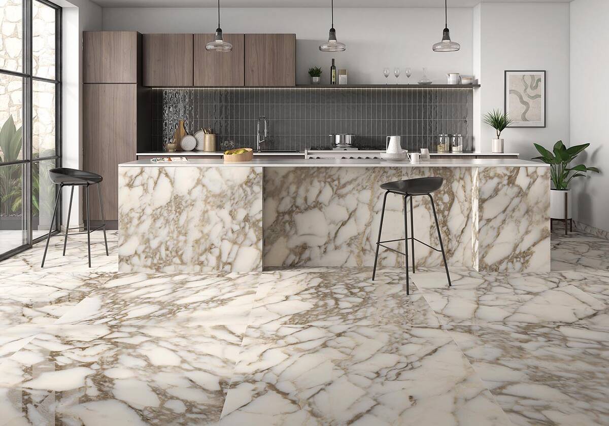 Large format ceramic tiles can cover all surfaces and create durable flooring. (Coverings/Pamesa)