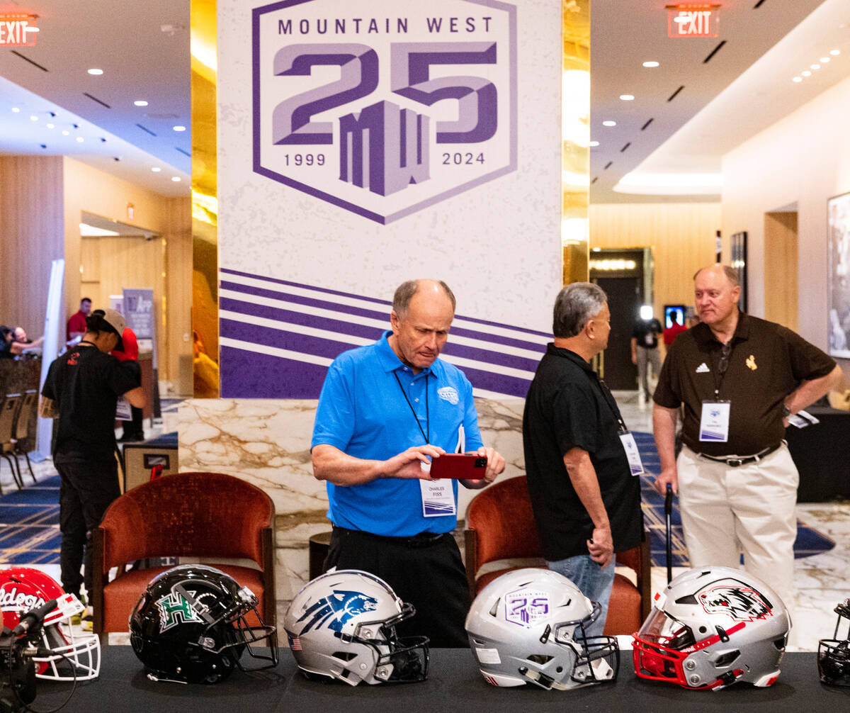 The 2023 Mountain West football team helmets are displayed during football media days at Circa ...