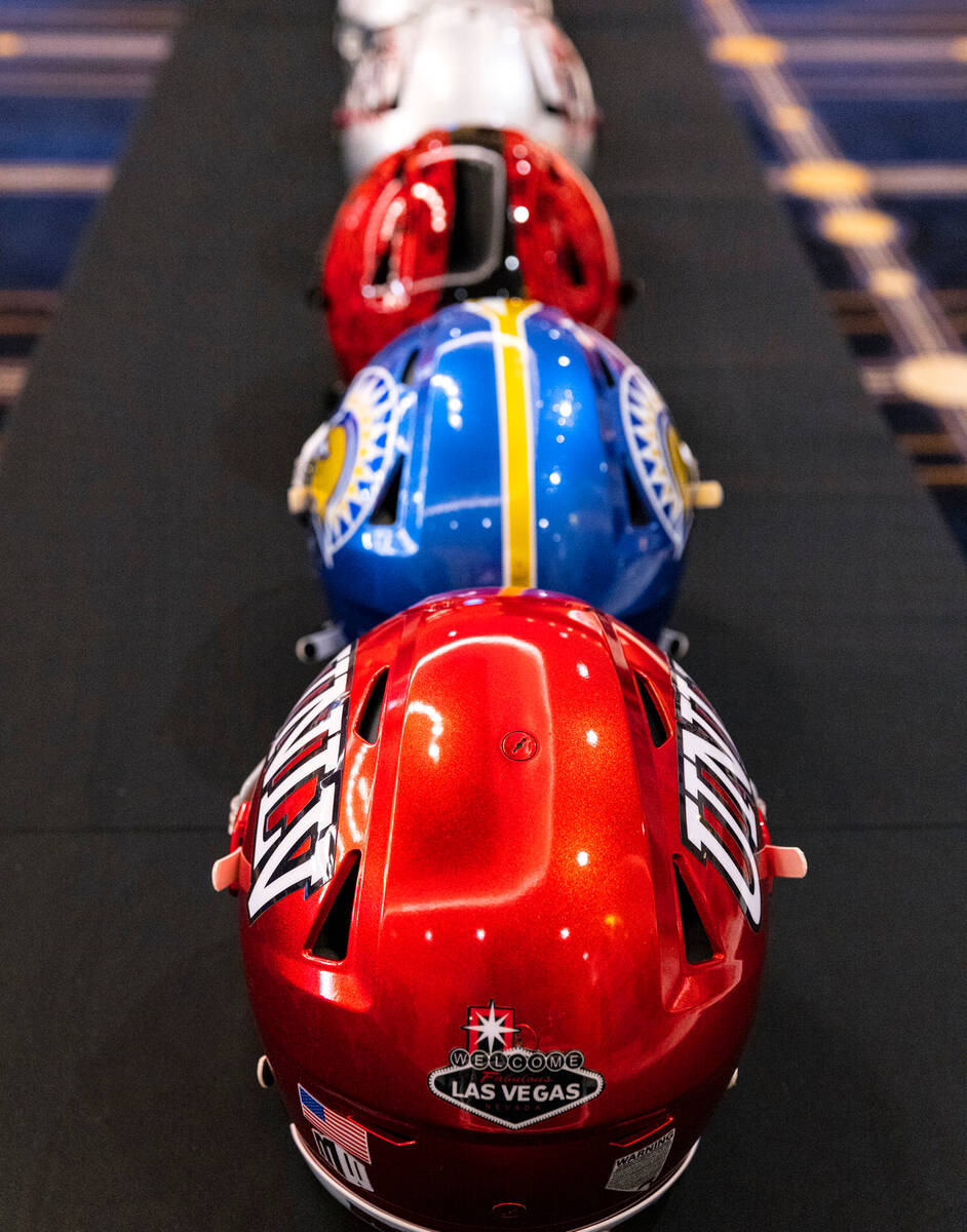 The 2023 Mountain West football team helmets are displayed during football media days at Circa ...
