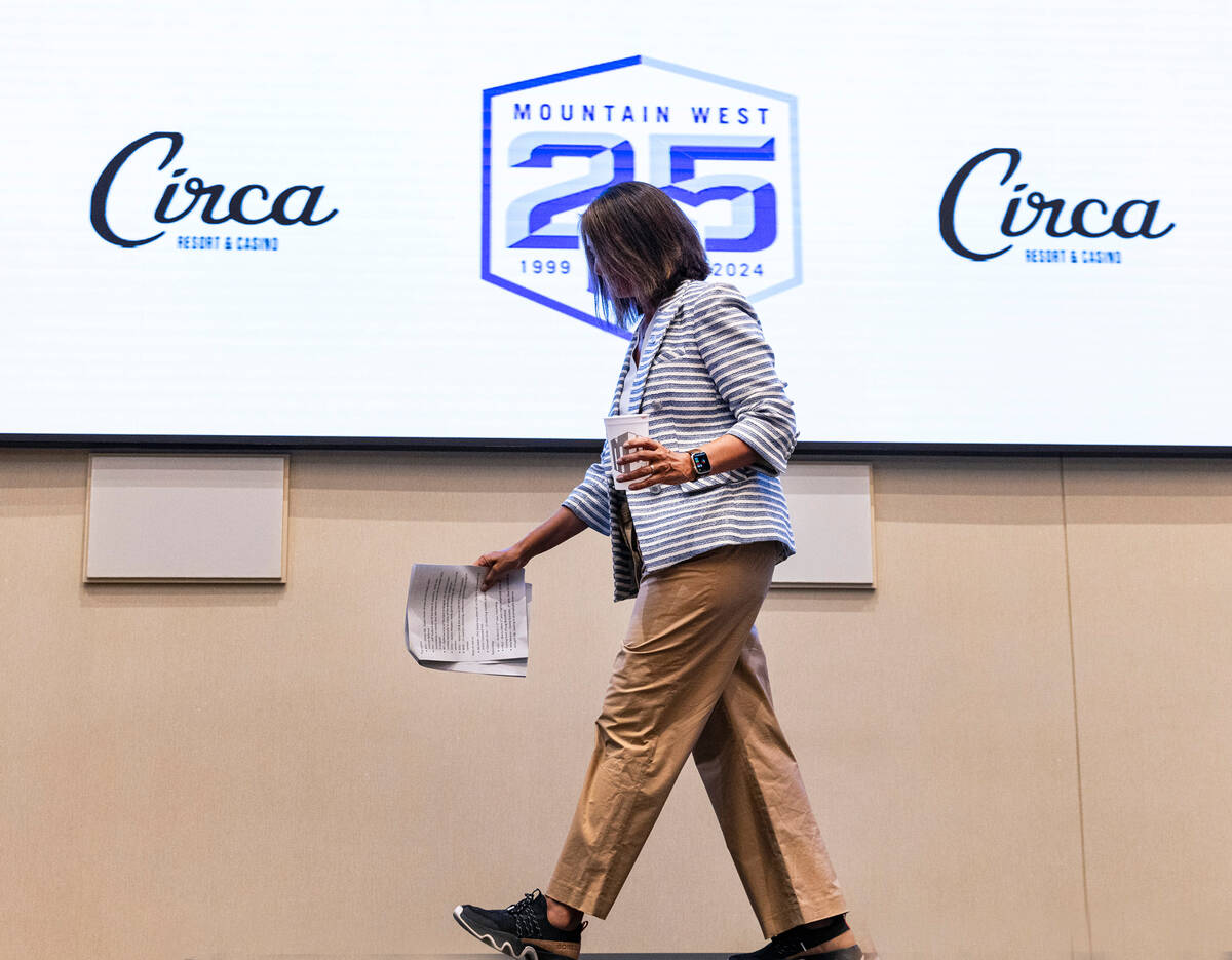 Gloria Nevarez, commissioner of the Mountain West Conference, leaves the podium after speaking ...