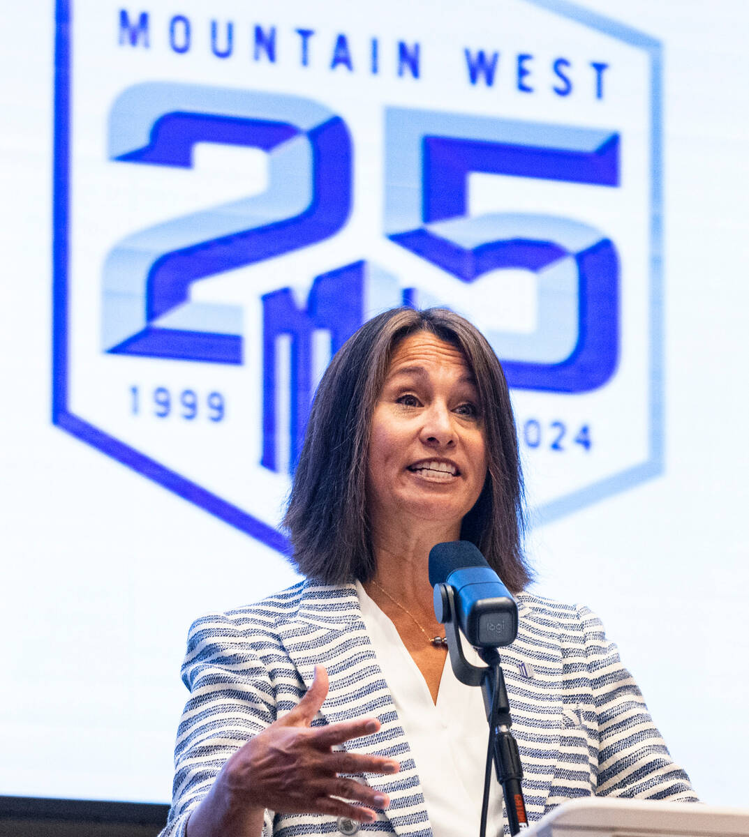 Gloria Nevarez, commissioner of the Mountain West Conference, speaks during football media days ...