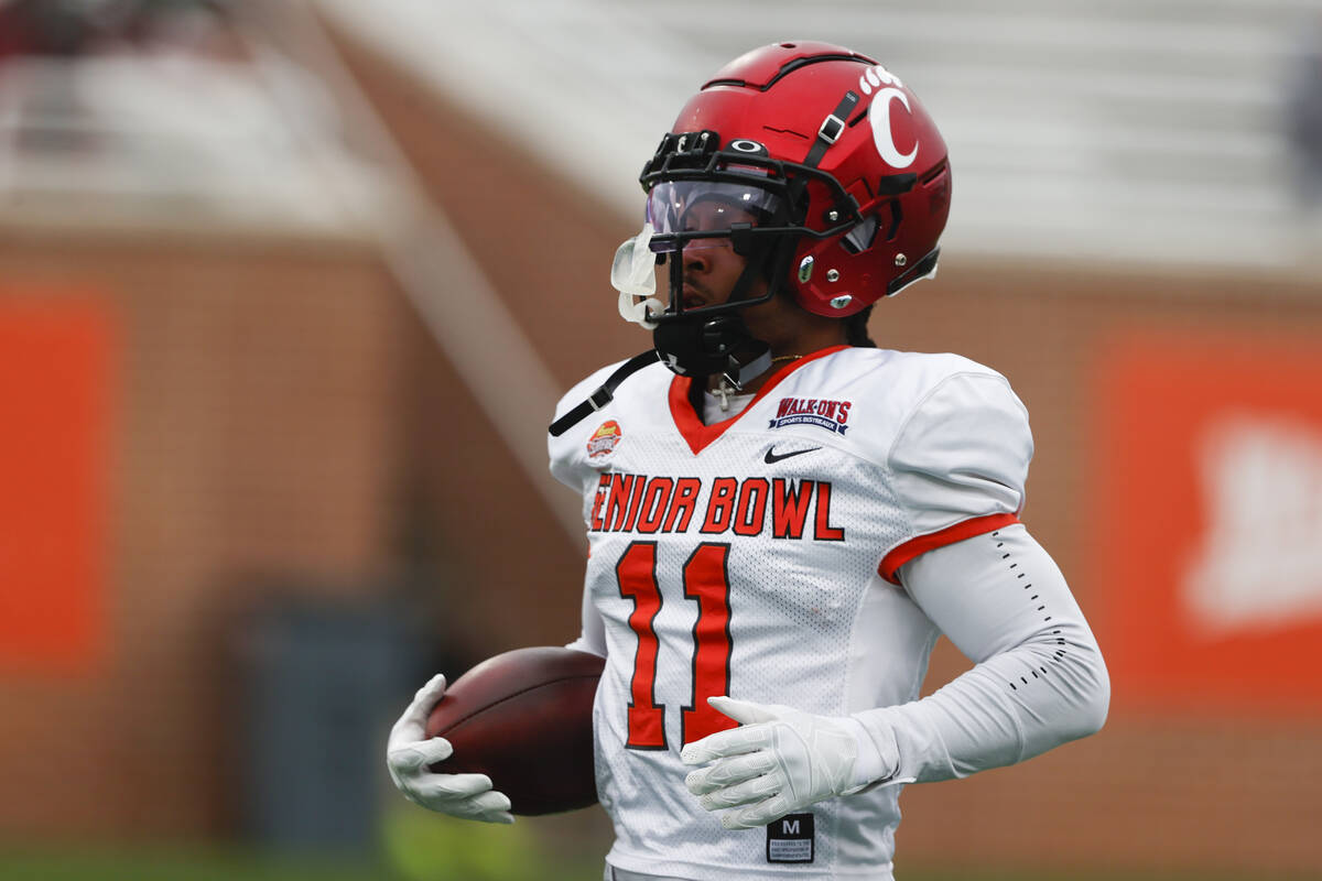 National wide receiver Tre Tucker of Cincinnati (11) runs drills during practice for the Senior ...