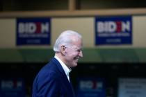 Presidential candidate Joe Biden laughs at a joke he made during a campaign event at Rancho Hig ...