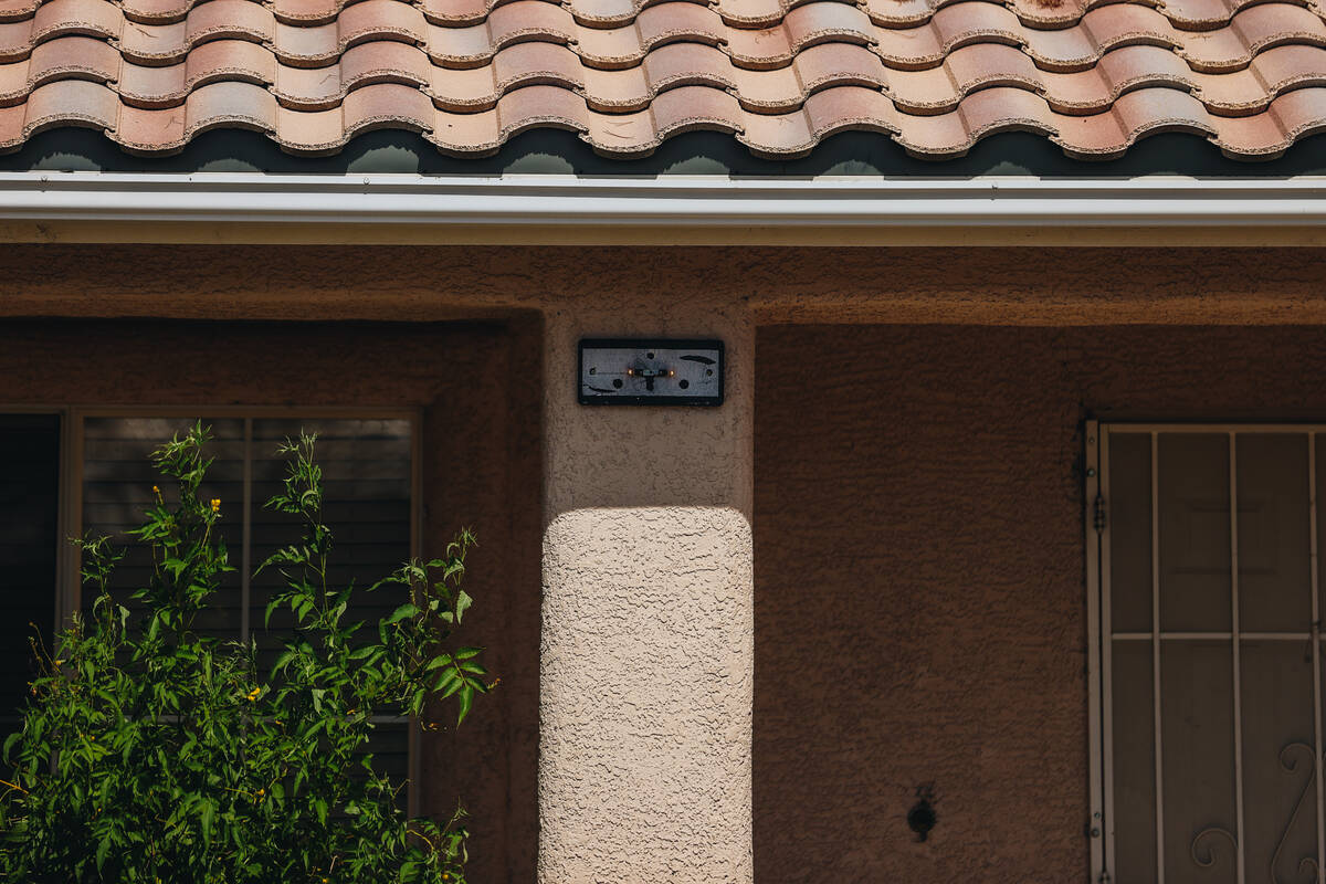 An house number plate is left blank after it was ripped off at a house which was searched by po ...