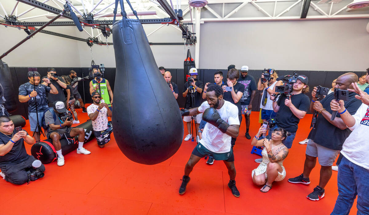 Terence Crawford strikes a heavy bag at the UFC Apex gym on Wednesday, July 19, 2023, in Las Ve ...