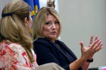 Henderson Mayor Michelle Romero, right, speaks, Thursday, July 20, 2023, as Laurie Norkus, a br ...
