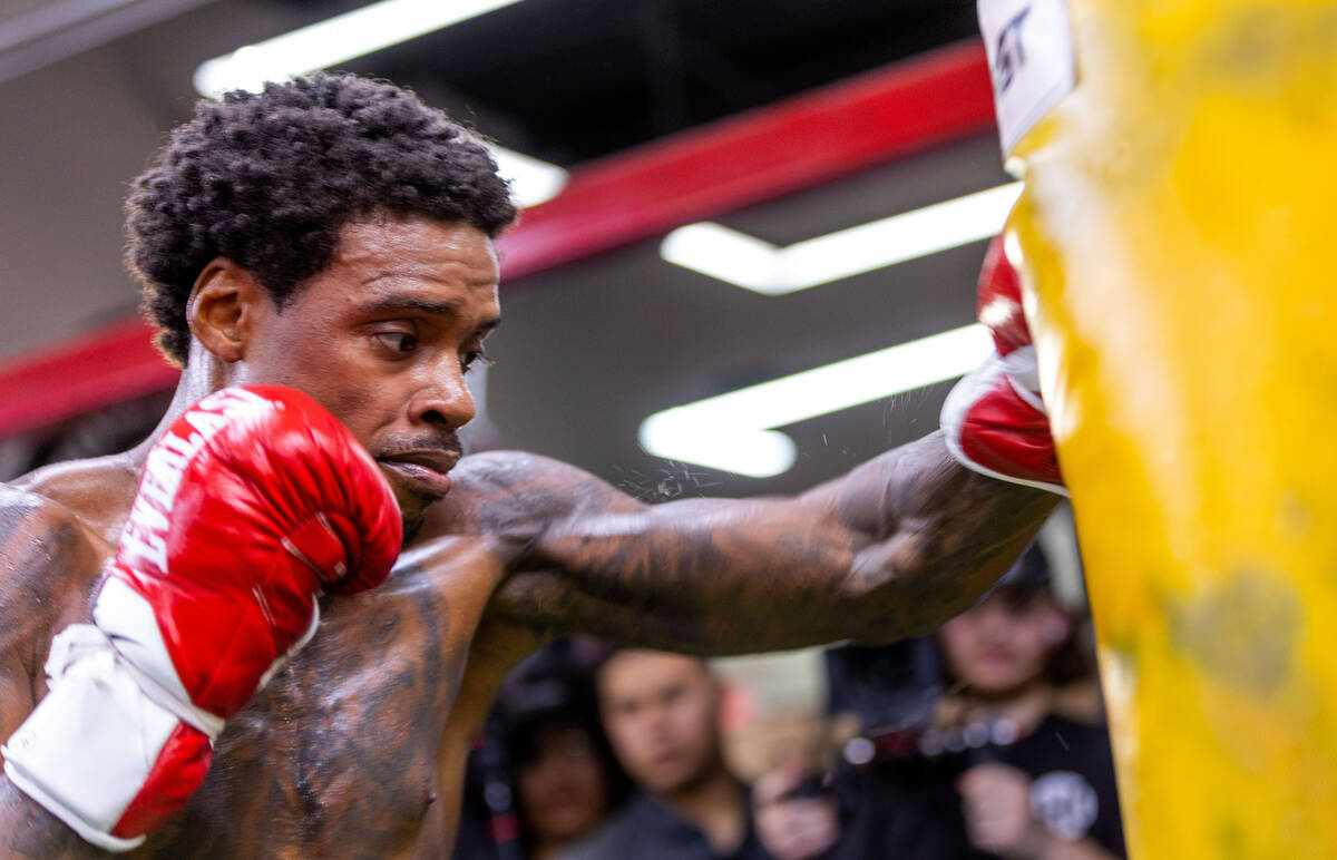 Fighter Errol Spence Jr. hits the heavy bag during a media workout day at the Fight Capital Gym ...