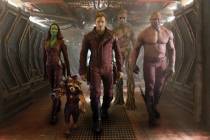 From left, Zoe Saldana, Rocket Racoon (voiced by Bradley Cooper), Chris Pratt, Groot (voiced by ...