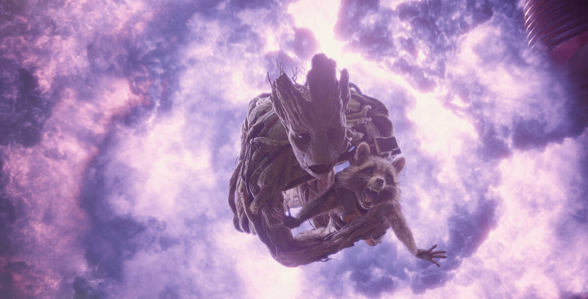 Groot (voiced by Vin Diesel), left, and Rocket Racoon (voiced by Bradley Cooper) appear in a sc ...