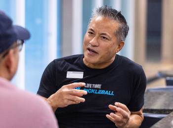 Tom Yeh, head pickleball pro for Life Time Fitness, speaks during an interview with the Review- ...