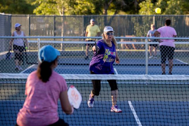 Sheila Stewart, a member of the Neon Picklers senior group, plays pickleball at Aloha Shores Pa ...