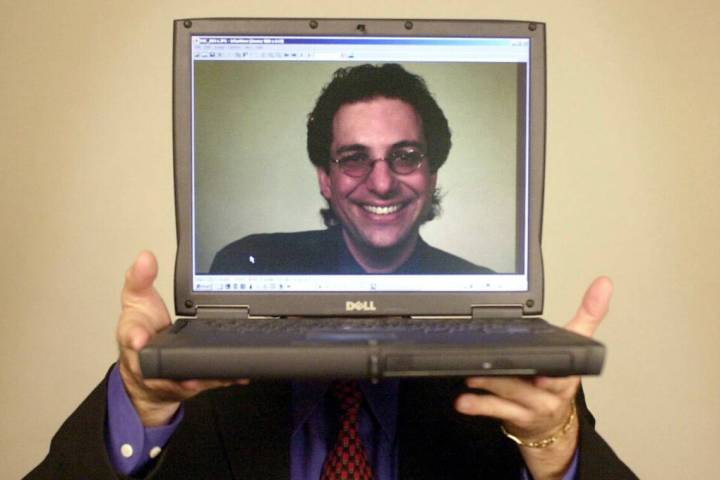 Kevin Mitnick poses for a portrait Thursday, June 27, 2002, in Las Vegas. (AP Photo/Joe Cavaretta)