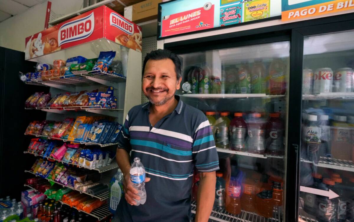Store manager Navor Herrera stands inside the Las Palmitas Mini Market where the winning lotter ...