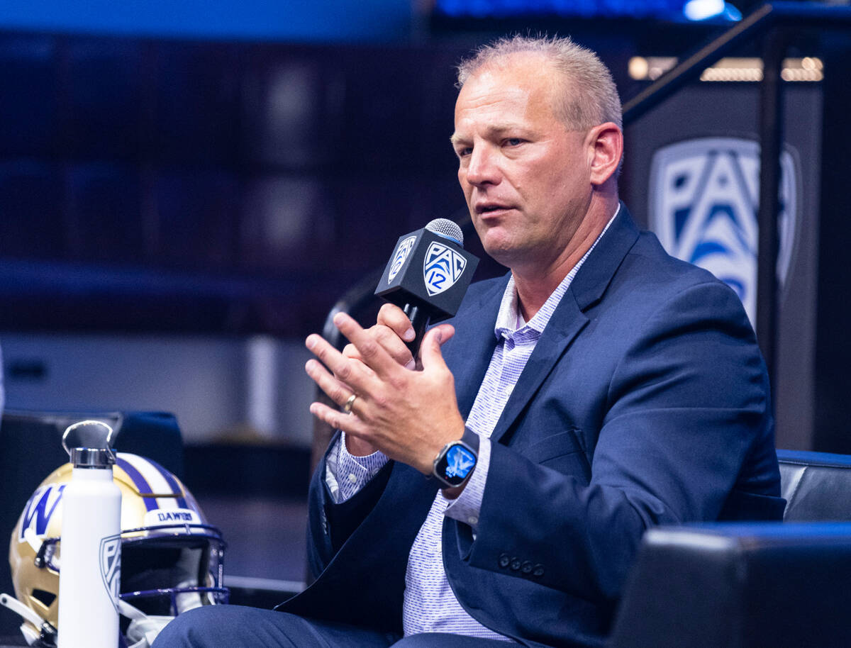 Washington Huskies head coach Kalen DeBoer speaks during the Pac-12 Football media day at Resor ...