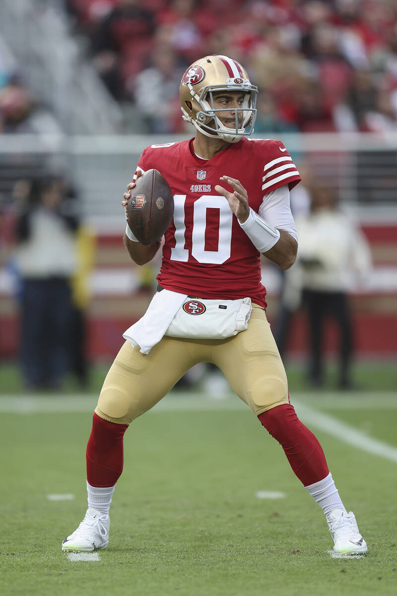San Francisco 49ers quarterback Jimmy Garoppolo (10) looks to pass the ball in the first quarte ...