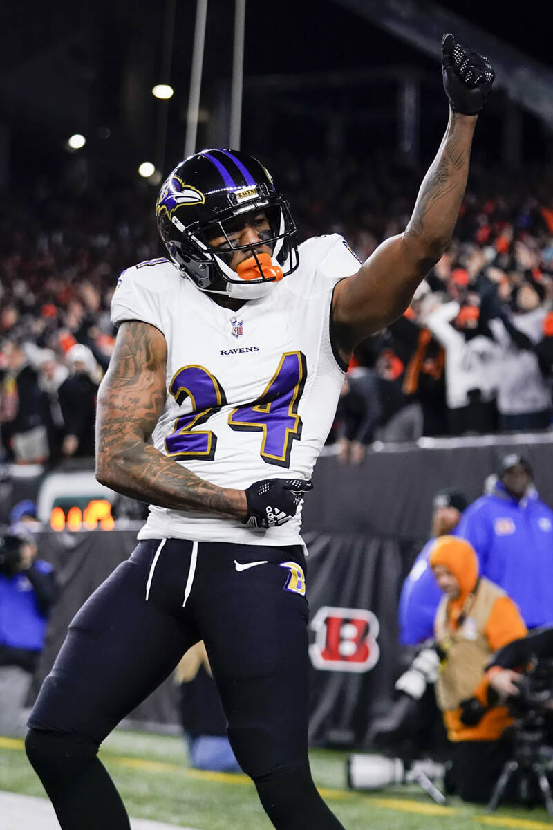 Baltimore Ravens cornerback Marcus Peters (24) reacts after breaking up a pass during a wild-ca ...