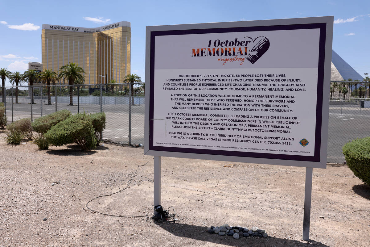 A sign marking the Route 91 Harvest festival shooting memorial site at Reno Avenue and Giles St ...