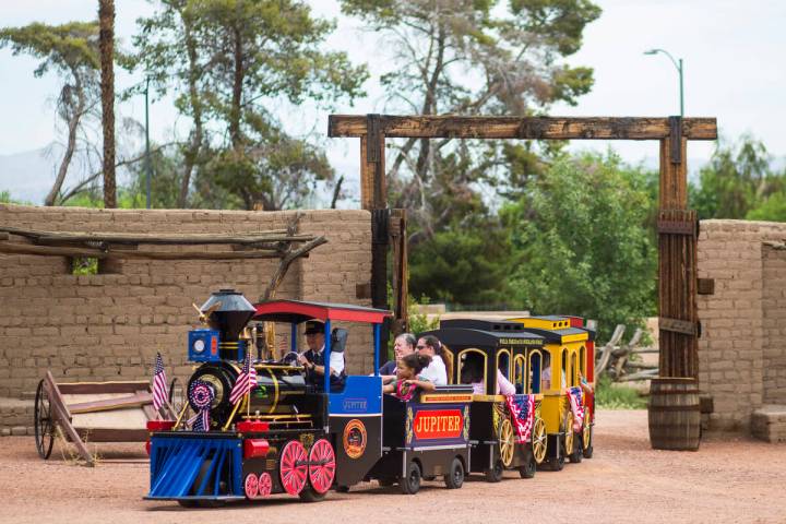 Attendees enjoy a train ride during the "Pioneer Day" event at the Old Las Vegas Mormon Fort St ...