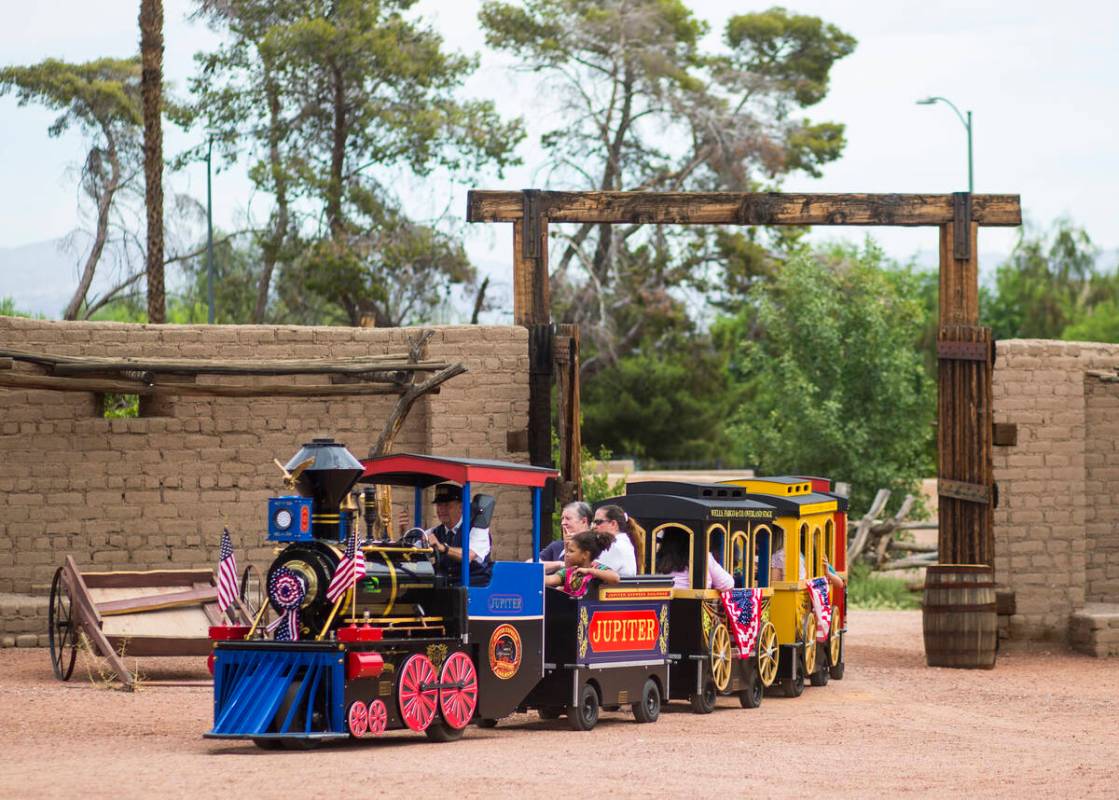 Attendees enjoy a train ride during the "Pioneer Day" event at the Old Las Vegas Mormon Fort St ...