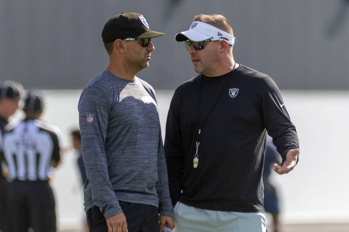 Raiders general manager Dave Ziegler, left, and head coach Josh McDaniels during the teamȁ ...