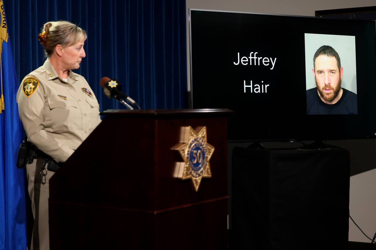 Las Vegas police Assistant Sheriff Jamie Prosser shows a photo of suspected kidnapper Jeffrey H ...