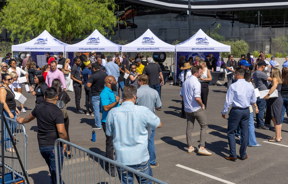 People gather as the Super Bowl Host Committee hosts the 200 businesses participating in their ...