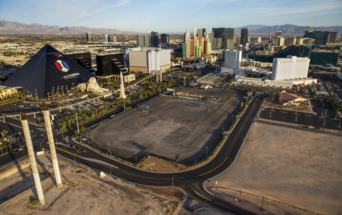 The former Route 91 Harvest festival site, center, surrounds the shuttered, former White Sands ...