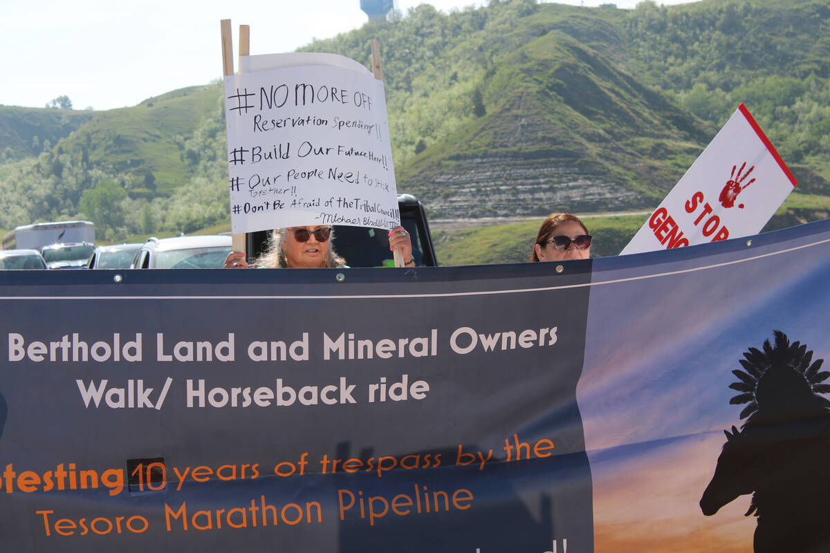 People protest against MHA Nation leadership while walking across the Four Bears bridge in New ...