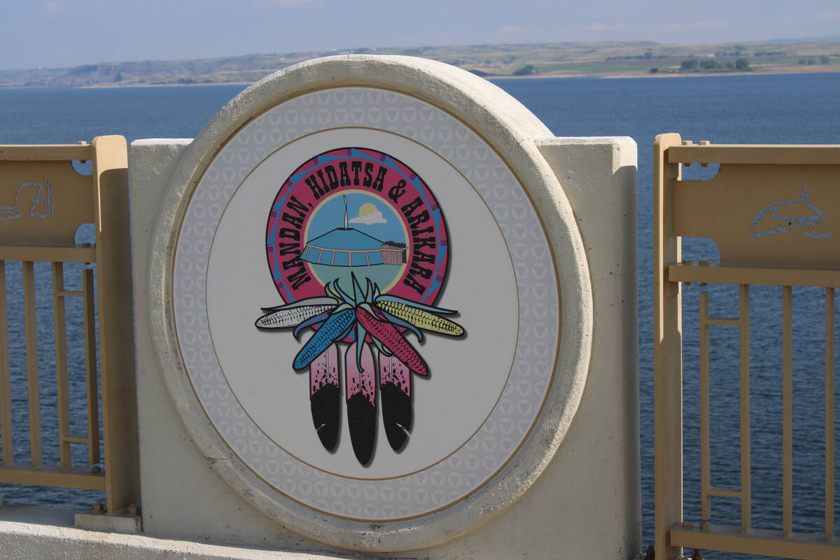 An emblem bears the names of the Mandan, Hidatsa, and Arikara tribes on the Four Bears bridge i ...