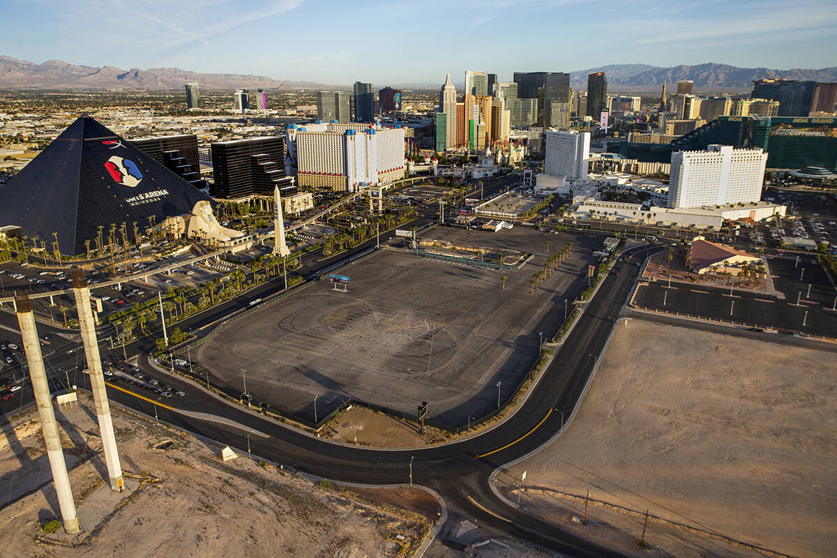 The former Route 91 Harvest festival site, center, surrounds the shuttered, former White Sands ...