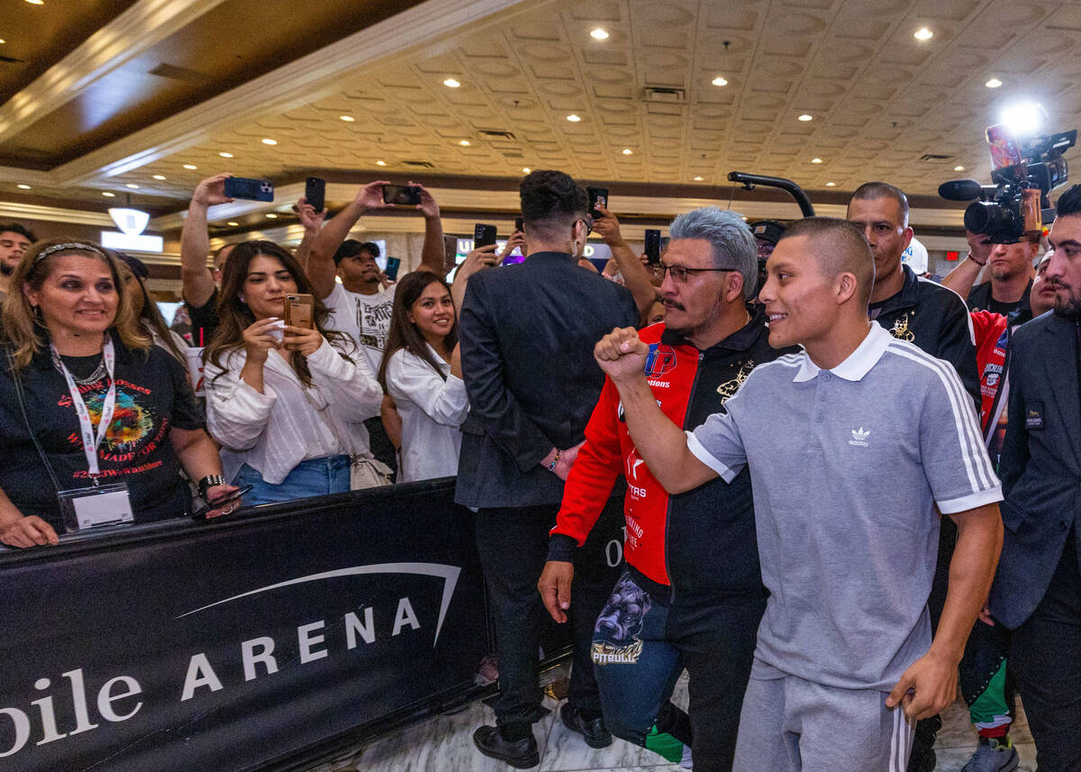 WBA lightweight boxer Isaac Cruz greets fans during grand arrivals inside the MGM Grand on Tues ...