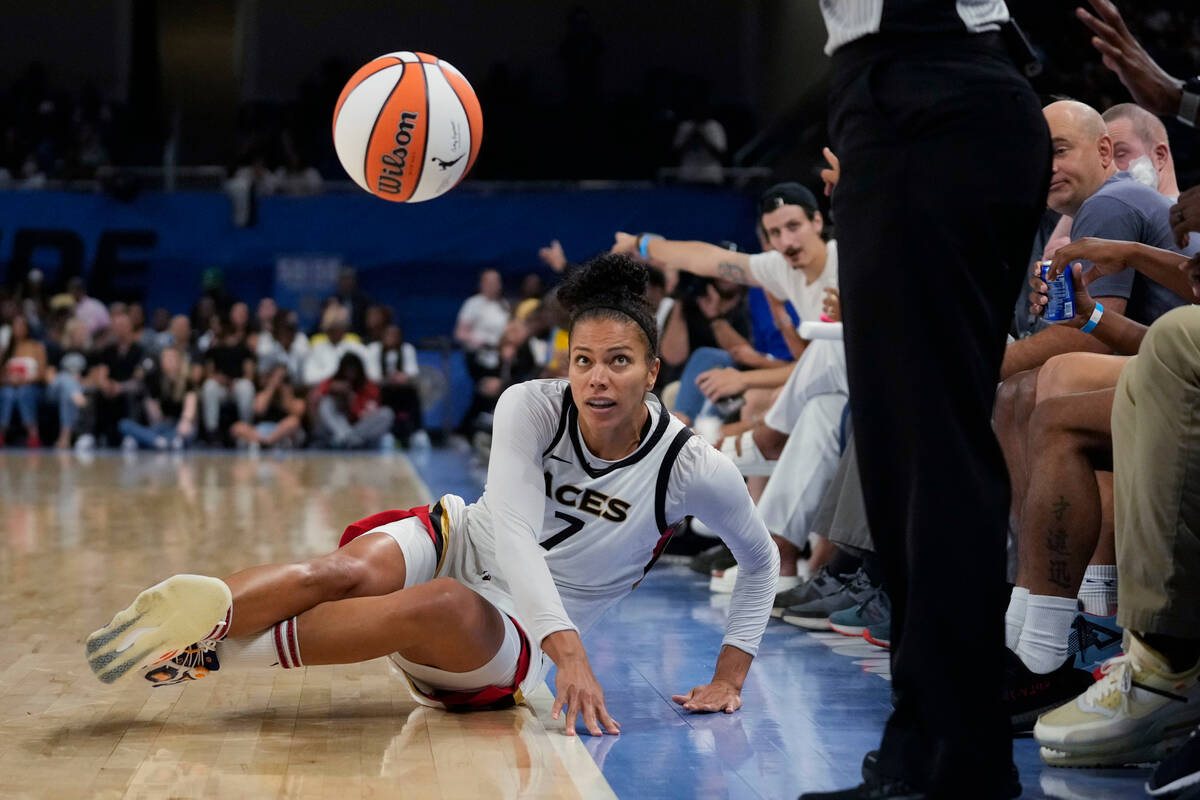Las Vegas Aces forward Alysha Clark falls out of bounds during the second half of the team's WN ...