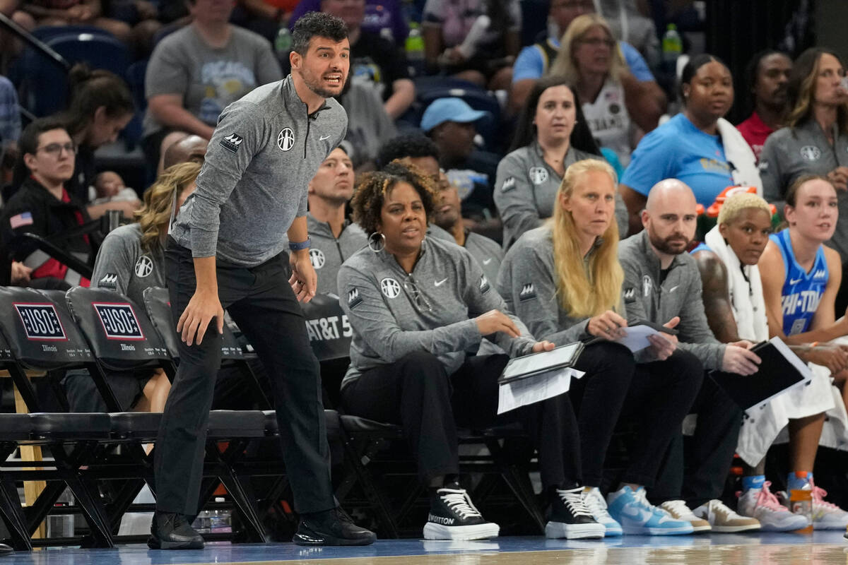 Chicago Sky interim coach Emre Vatansever yells to players during the first half of their WNBA ...
