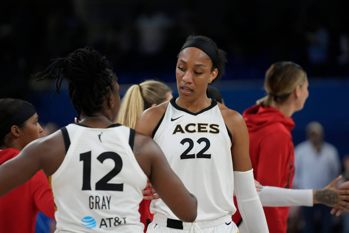 Las Vegas Aces forward A'ja Wilson, right, and guard Chelsea Gray celebrate their 107-95 victor ...