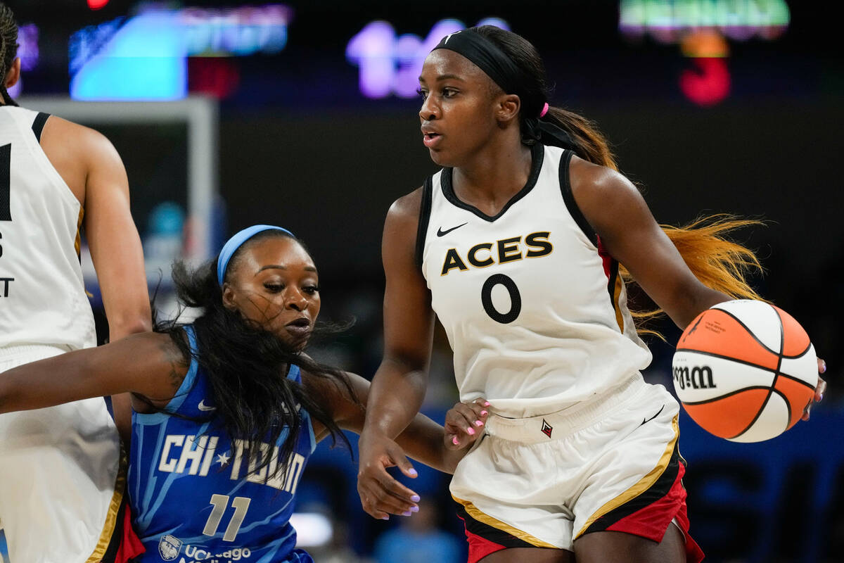 Chicago Sky guard Dana Evans, left, guards Las Vegas Aces guard Jackie Young during the second ...