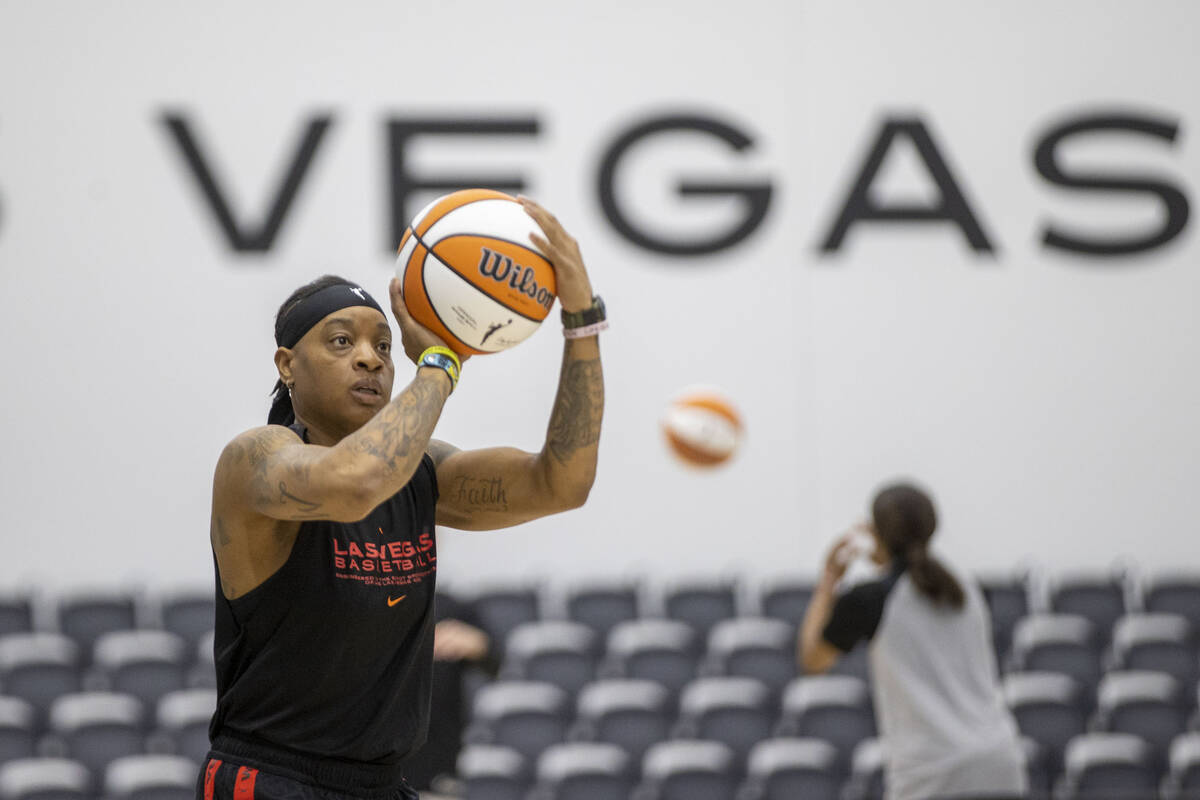 Las Vegas Aces guard Riquna Williams shoots the basketball during a team practice at their faci ...