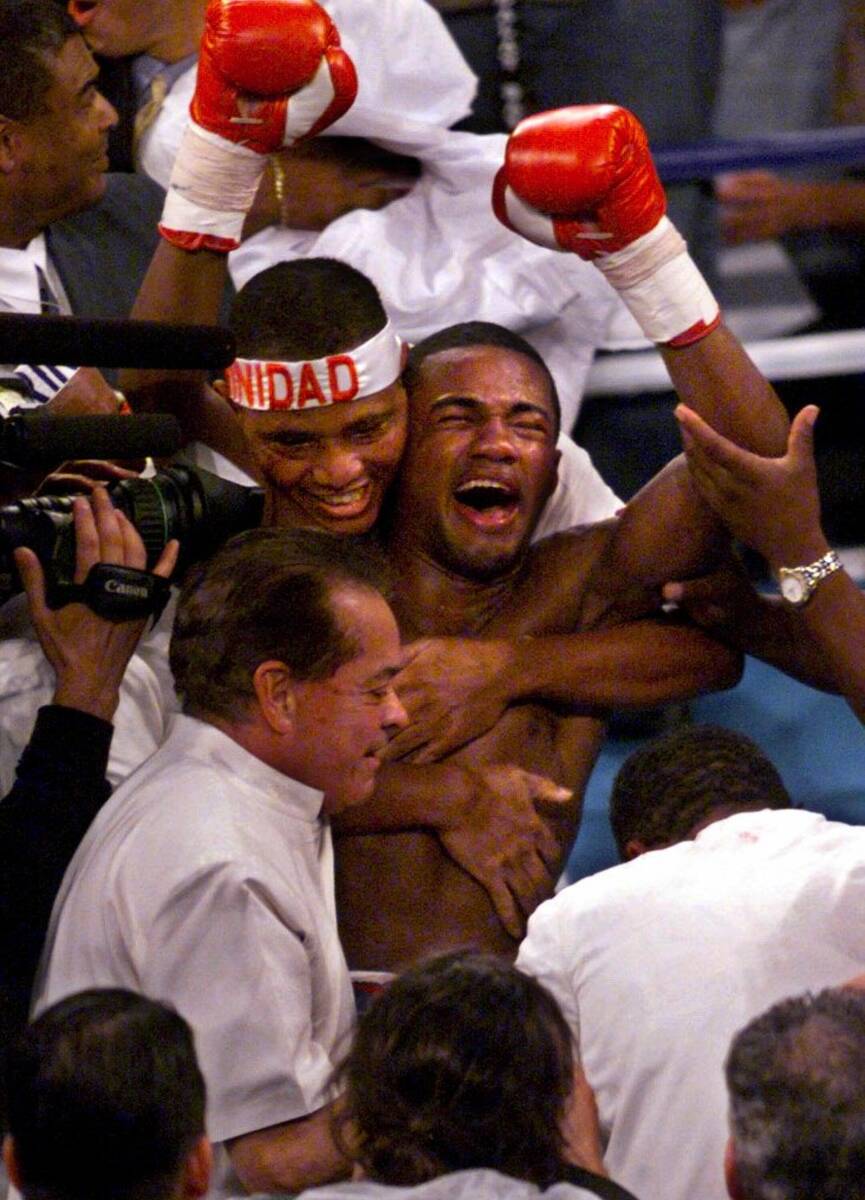 WBC and IBF welterweight champion Felix Trinidad after hearing he won a majority decision over ...