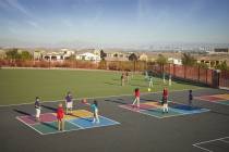 Children play ball at Doral Academy Red Rock, a charter school in Summerlin. With 26 public, pr ...