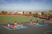 Children play ball at Doral Academy Red Rock, a charter school in Summerlin. With 26 public, pr ...