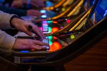 Nevada casinos continued its struggle to keep up with the torrid pace of historic gaming win, b ...