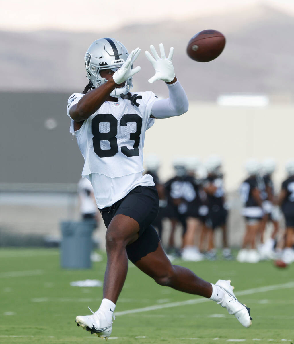 Raiders wide receiver Kristian Wilkerson (83) catches a pass during training camp at the Interm ...