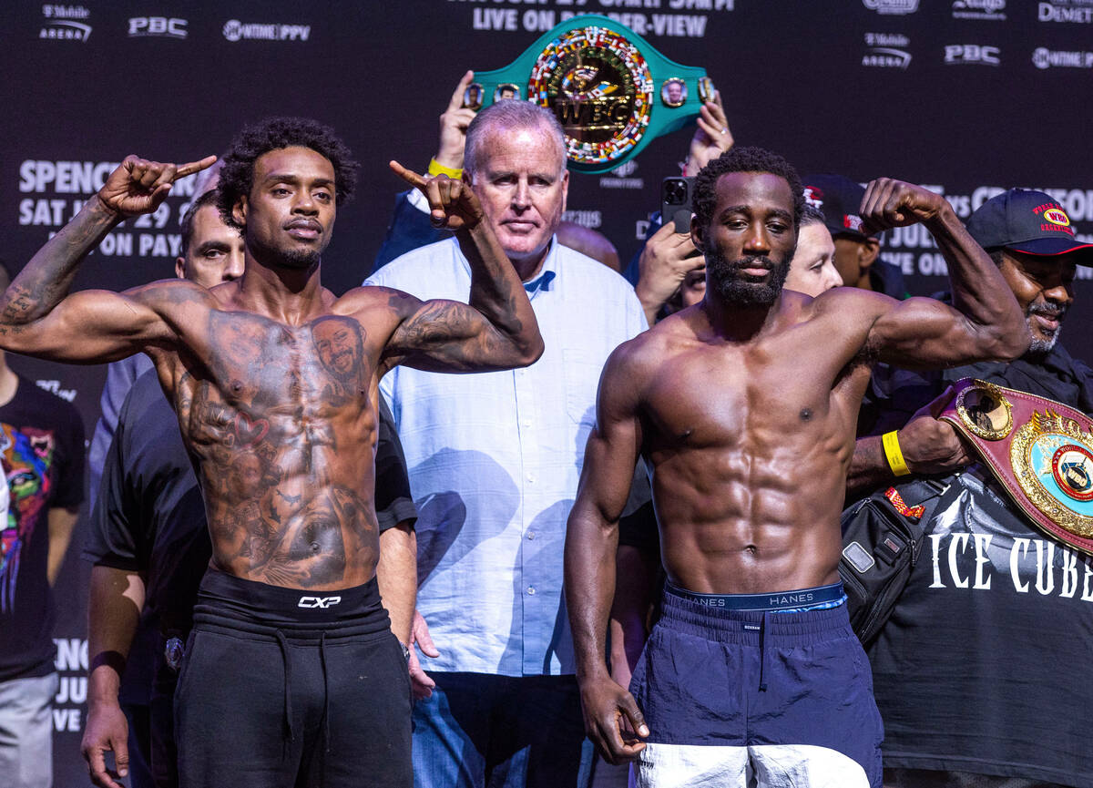 Boxers Errol Spence Jr. and Terence Crawford pose as they come together following their weigh i ...