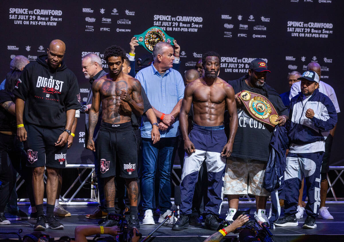 Boxers Errol Spence Jr. and Terence Crawford and teams come together following their weigh ins ...