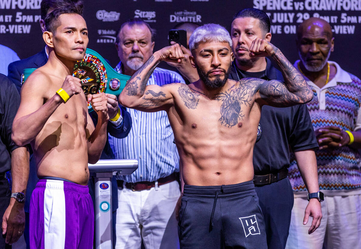 Boxers Nonito Donaire and Alexandro Santiago pose following their weigh ins ahead of their figh ...